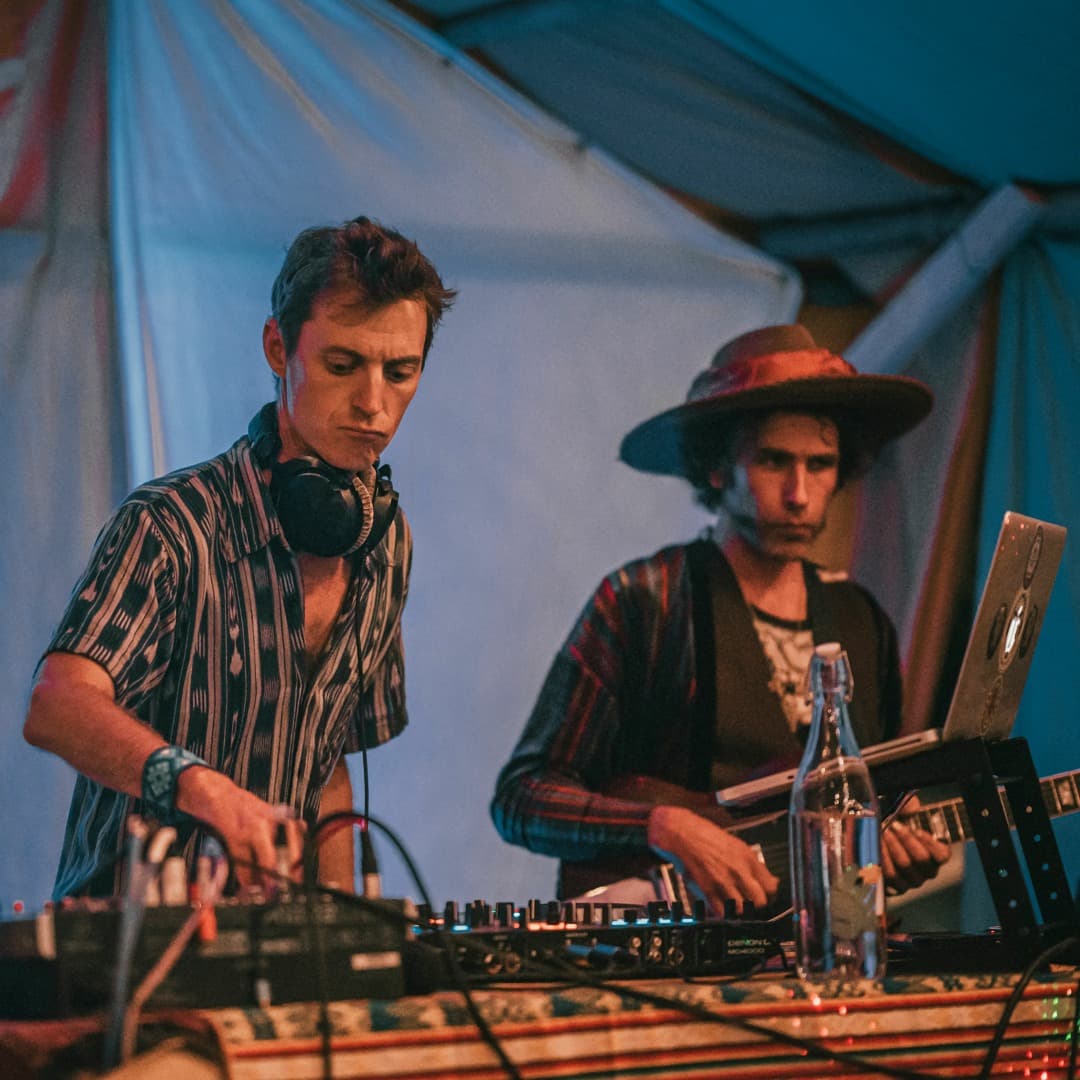 Yemanjo duo performing with live instruments and decks